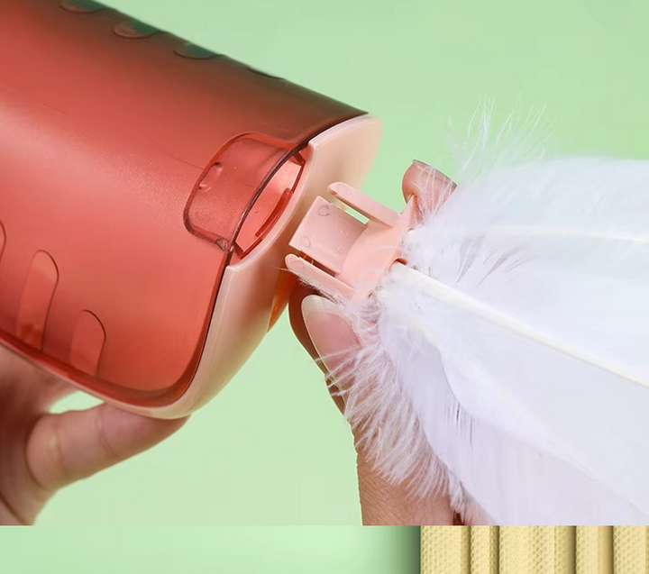 Engaging interactive cat toy featuring a feather attachment & treat rewards for playful cats.