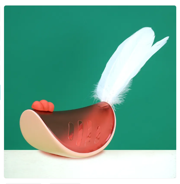 Multi-functional cat toy: interactive feather, treat dispenser for mental & physical play.