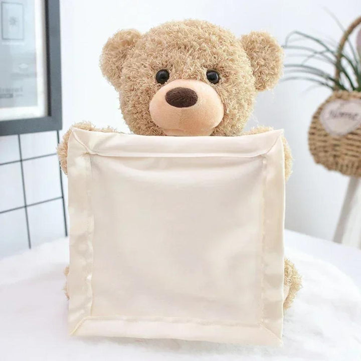 Cuddly unisex plush peekaboo bear for toddlers. Soft stuffed animal with interactive arm movements for baby fun.