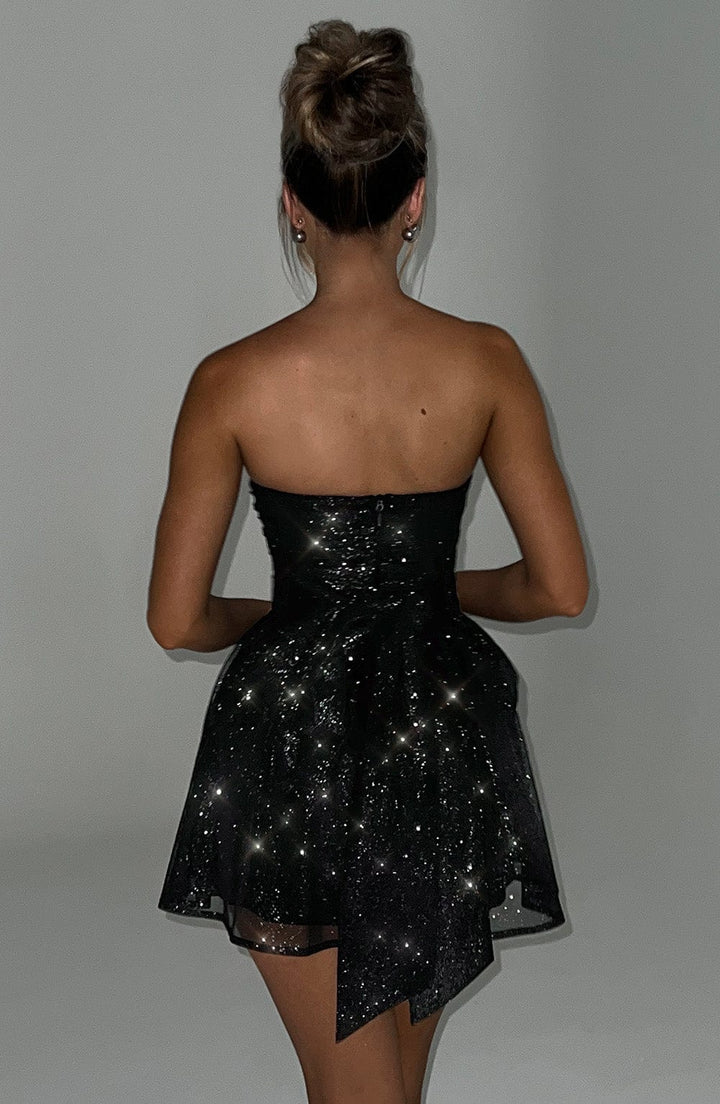 Beautiful women's strapless glitter mini dress. A-line cocktail style, perfect for evening events.