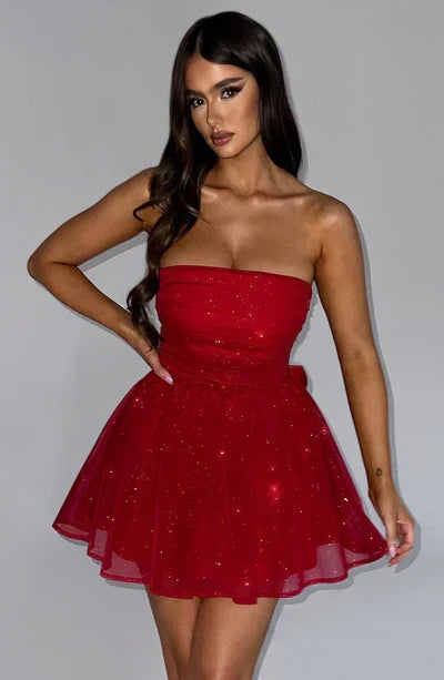 Celebration-ready strapless glitter mini dress. A-line party style, perfect for dancing.