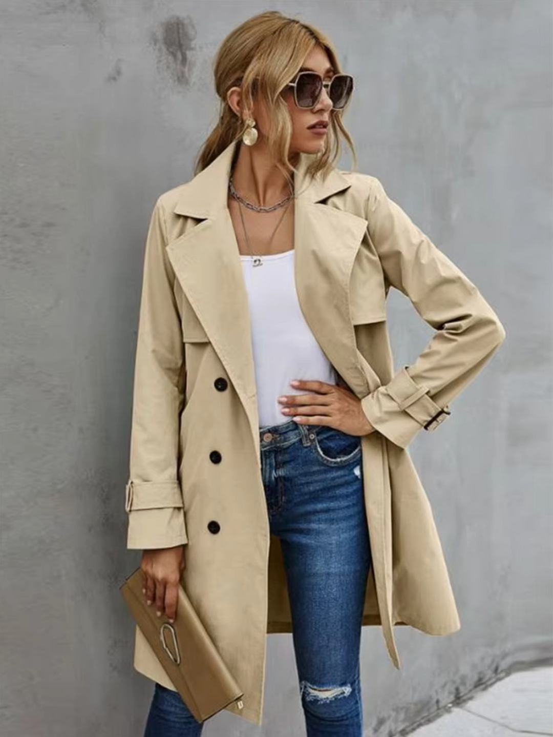 Khaki double-breasted belted trench coat for women, classic fall fashion outerwear.