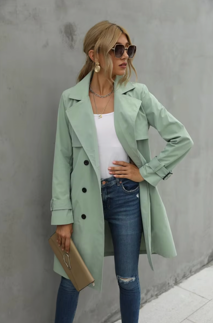 Classic khaki women's double-breasted trench coat with belt, perfect outerwear for fall.