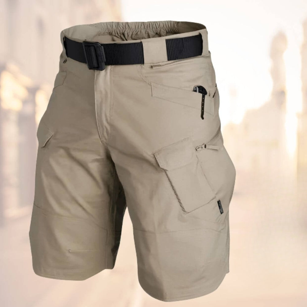 Men's durable tactical cargo shorts in olive green, ideal for hiking, camping & adventure-ready outdoor activities.