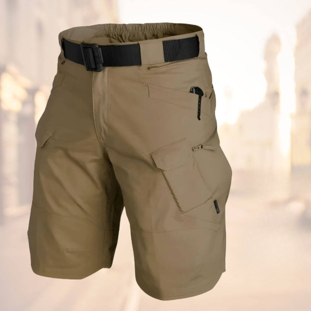 Grey men's adventure cargo shorts, quick-dry fabric & ample storage, essential for active outdoor lifestyles.