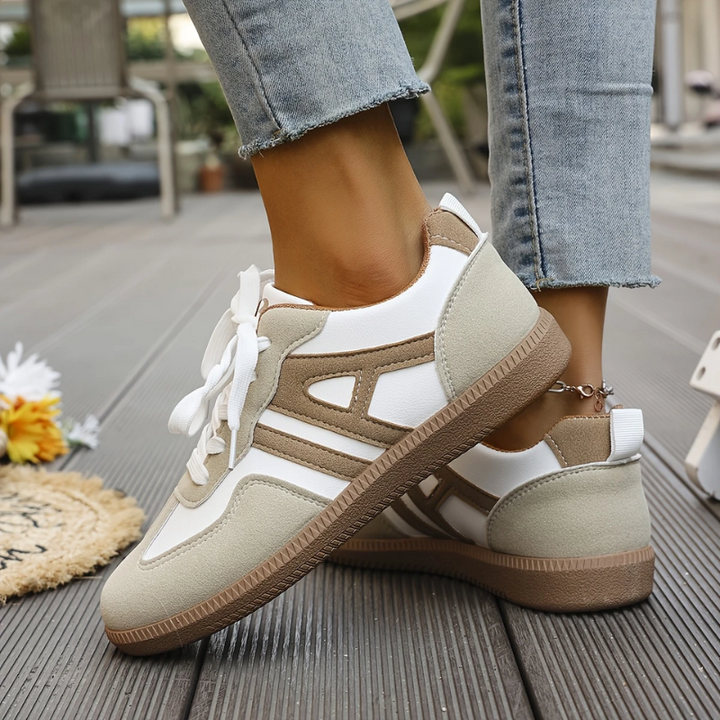 White casual orthopedic sneakers for men and women, featuring arch support for walking