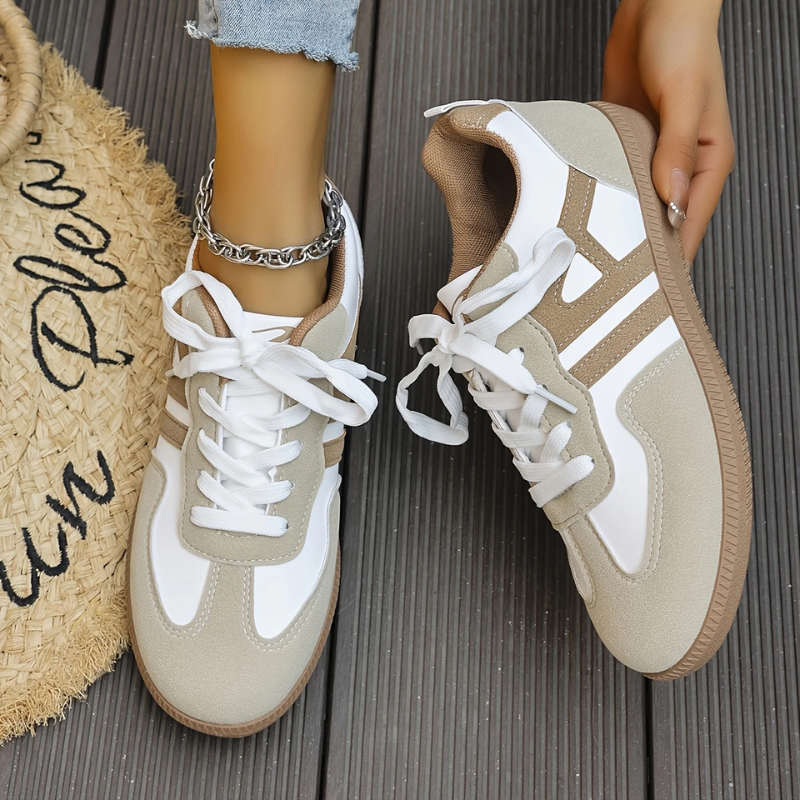 Side view of a khaki orthopedic walking sneaker, emphasizing its arch support design
