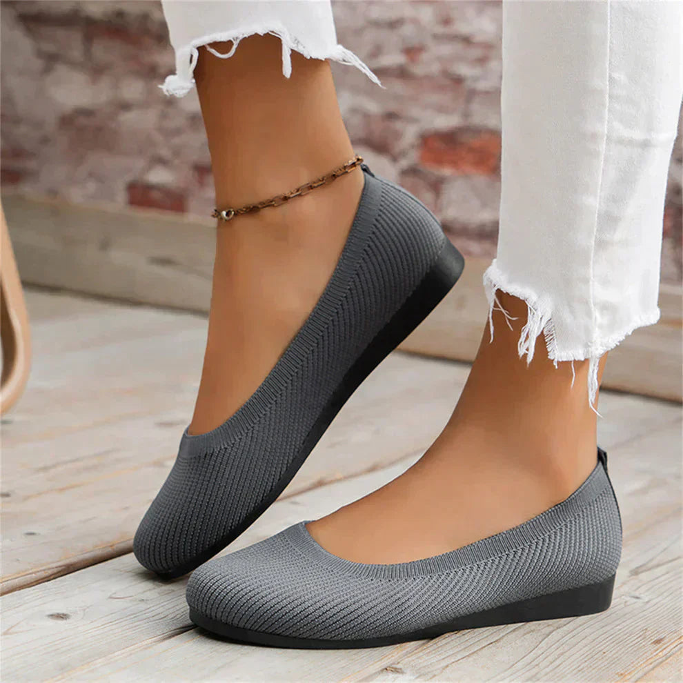 Grey women's flat shoes, offering comfort and style for casual spring fashion and daily wear.