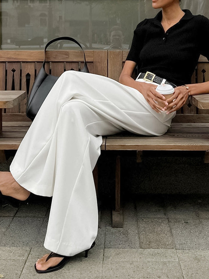 Front view of women's relaxed fit wide leg office trousers, offering all-day comfort