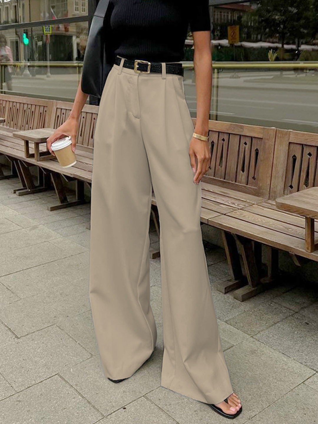 Side view of modern women's wide leg work pants, designed for a relaxed office fit