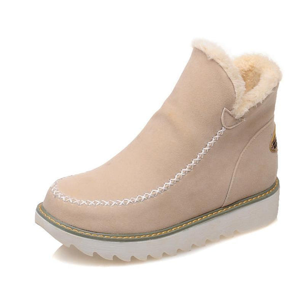 Waterproof insulated women's winter boots in black, designed for ultimate cold weather comfort