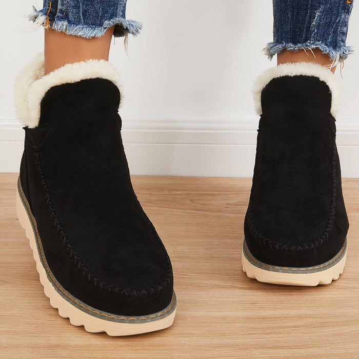 Black women's waterproof casual boots, insulated for warmth in cold weather conditions