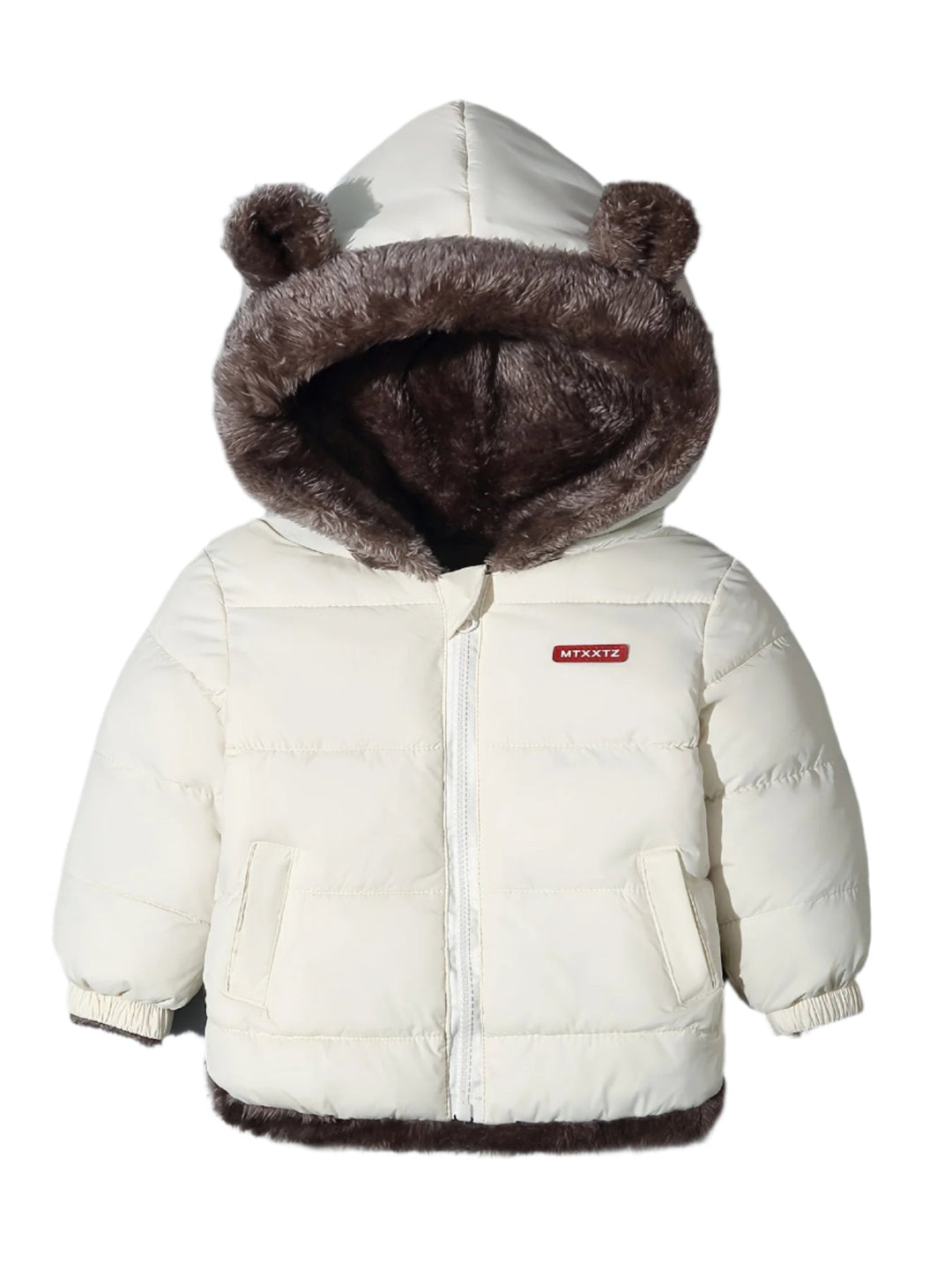 Child smiling in a warm, cozy bear hug winter coat, playing happily in the outdoor snow.