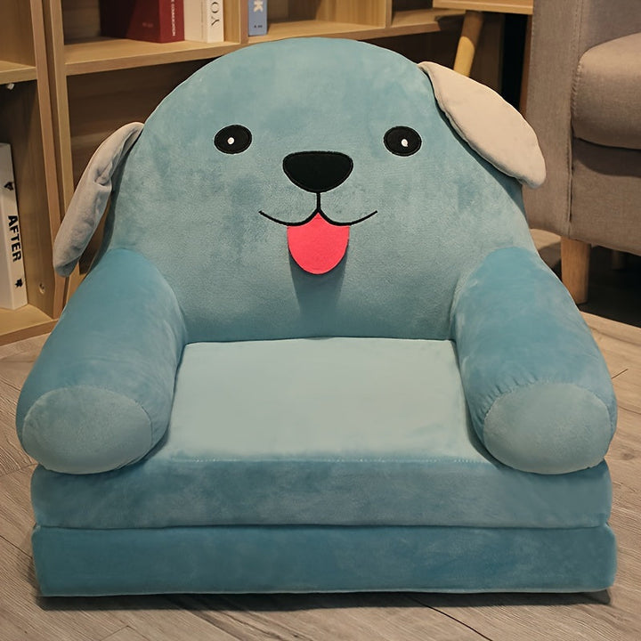 Child enjoying a soft folding sofa, reading a book in their cozy playroom seating. Perfect for quiet time.