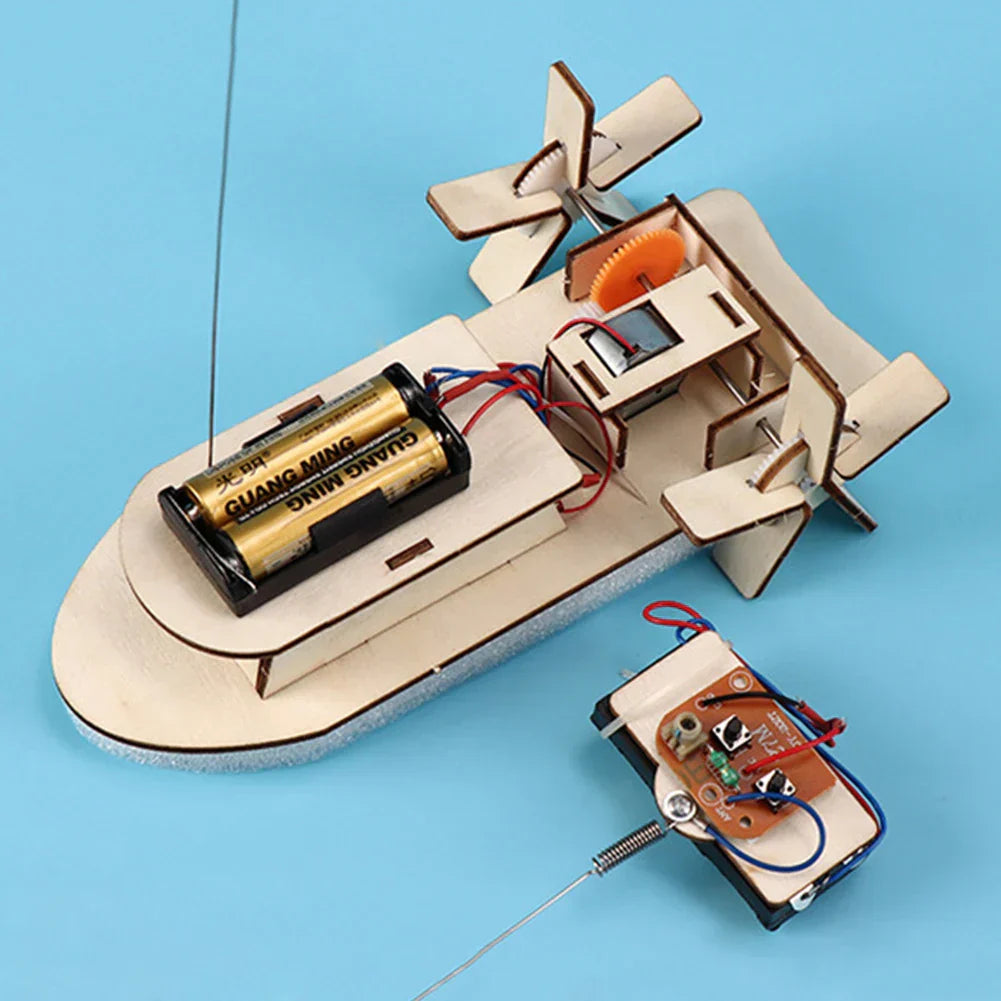 Educational building kit: Kids' wooden DIY electric toy boat. Hands-on engineering project.