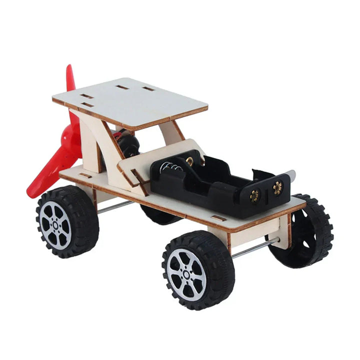 Kids' building toy: Wooden DIY electric boat kit. Develops STEM skills, engineering, & creativity.