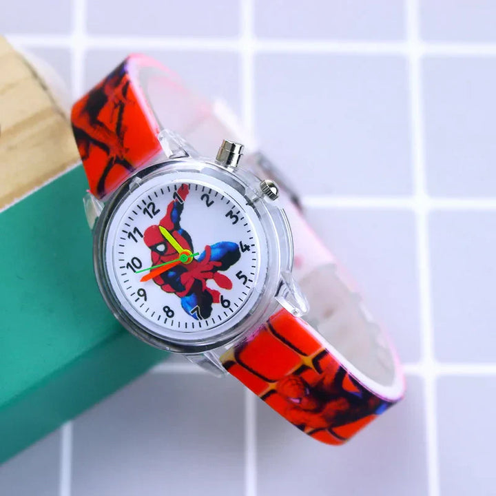Glow-in-the-dark feature of a children's cartoon watch shining bright in a dark room.