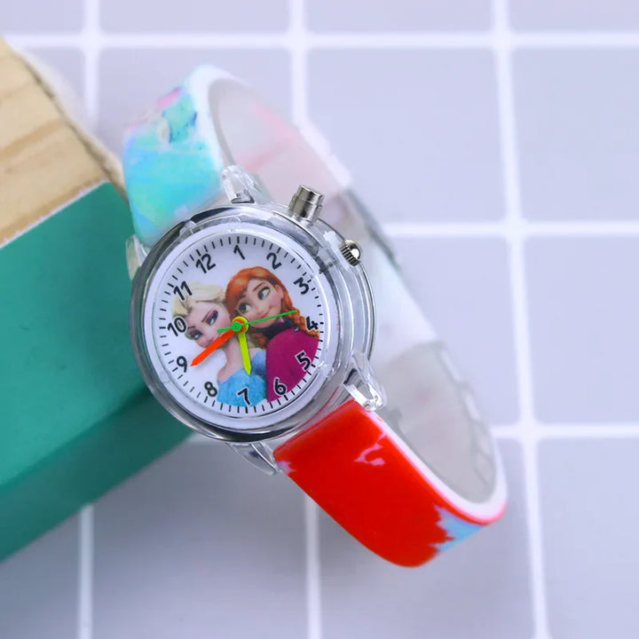 Kids' glow watch showing time, with vibrant cartoon characters on the dial and a comfy strap.