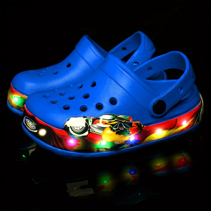 Children's glow in the dark clogs with ventilation ports. Ideal breathable footwear for hot summer days & play.