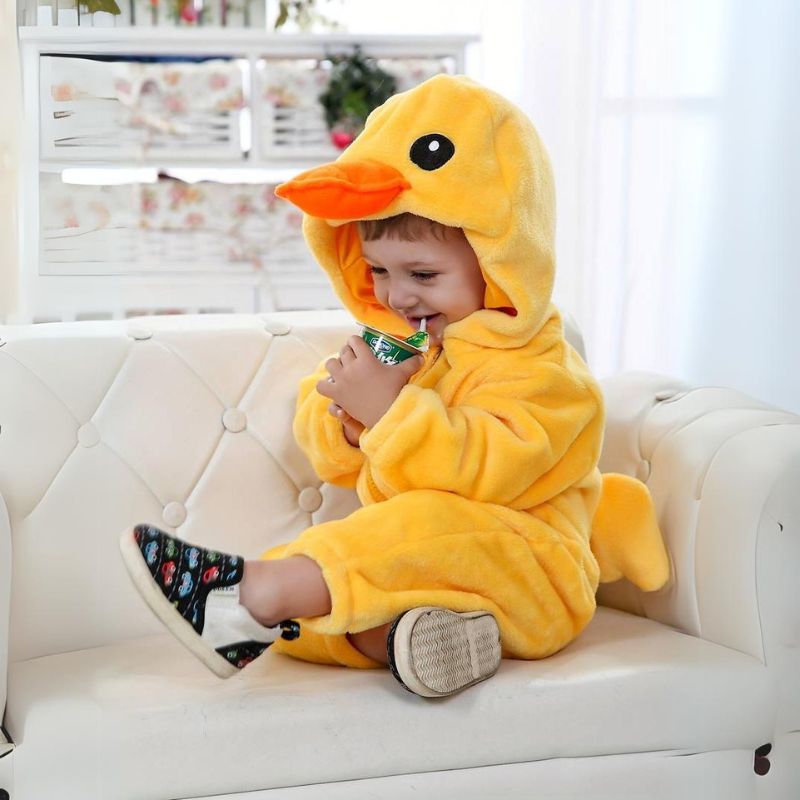Cute duck animal onesie jumpsuit for children. Soft, comfy kid's fashion, perfect for play or bedtime.