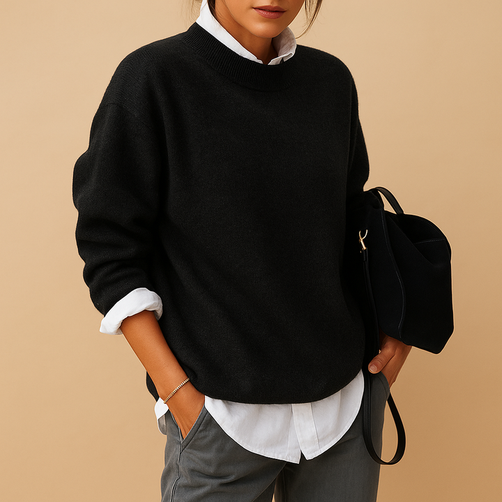 Elegant women's fine knit sweater with long sleeves, perfect for versatile, comfortable casual chic.