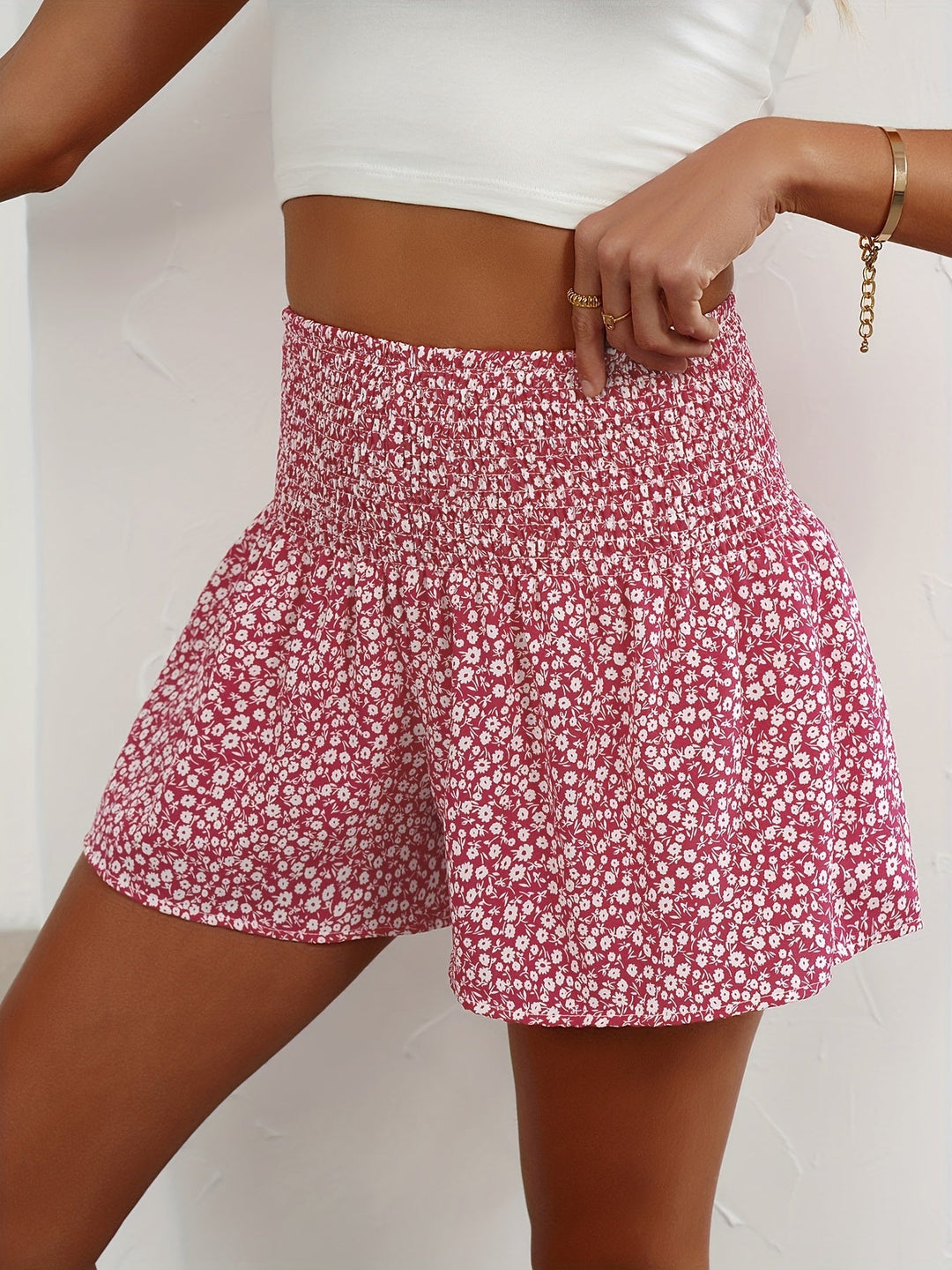 Lightweight women's floral shorts, ideal for summer fashion & vacation outfits.