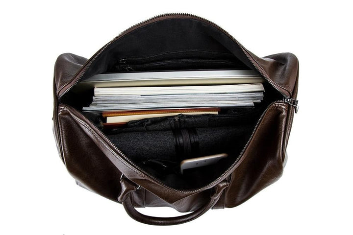 Premium brown PU leather travel duffel, unisex design for stylish weekenders.