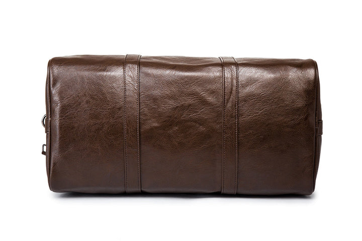 Brown PU leather unisex duffel, large weekender luggage for short trips.