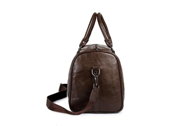 Durable large black PU leather travel bag, perfect carry-on for any trip.