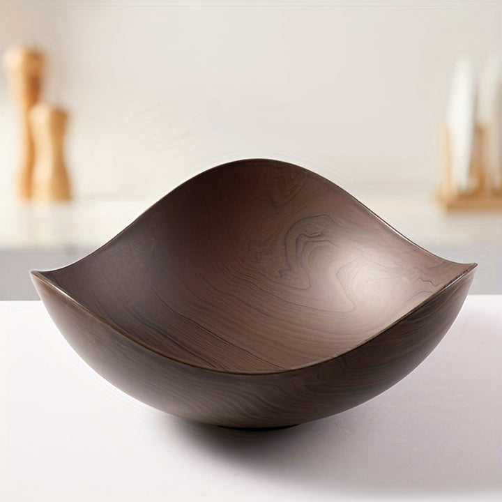 Practical wood look fruit bowl, perfect for kitchen use. Stores fruits & serves snacks.