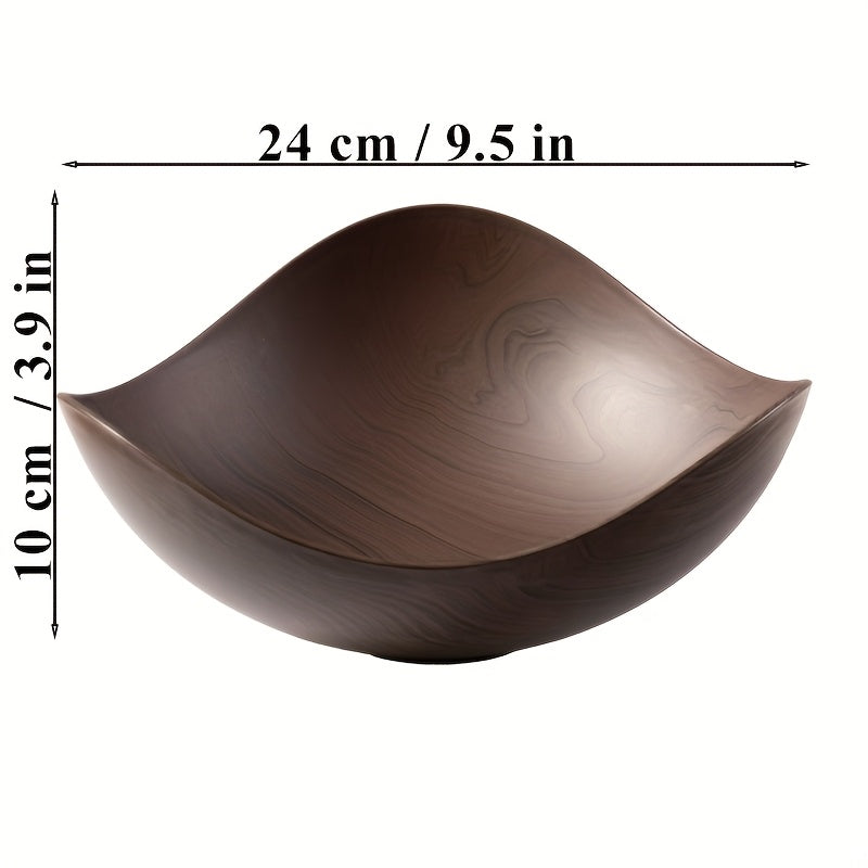 Modern organic wood look fruit bowl. Enhances kitchen table with decorative style.