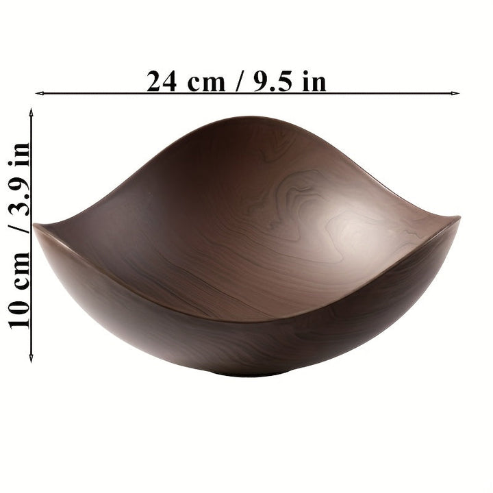 Modern organic wood look fruit bowl. Enhances kitchen table with decorative style.