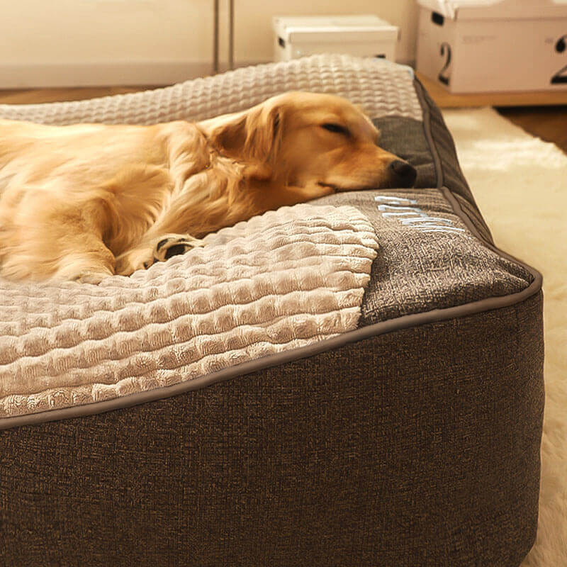 Premium large dog bed with memory foam mattress & plush headrest, perfect for big dogs needing joint relief.