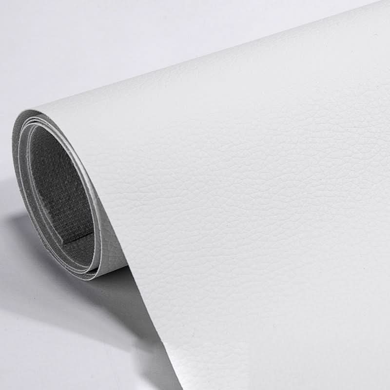 Durable leather & vinyl repair patch, self-adhesive for easy application on furniture & car seats.