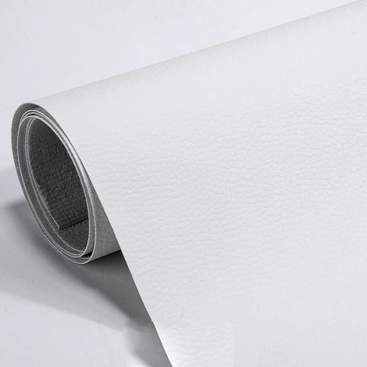 Durable leather & vinyl repair patch, self-adhesive for easy application on furniture & car seats.