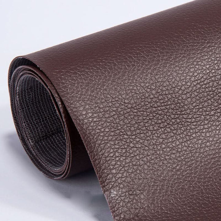Heavy-duty self-adhesive repair patch for restoring damaged leather & vinyl furniture.