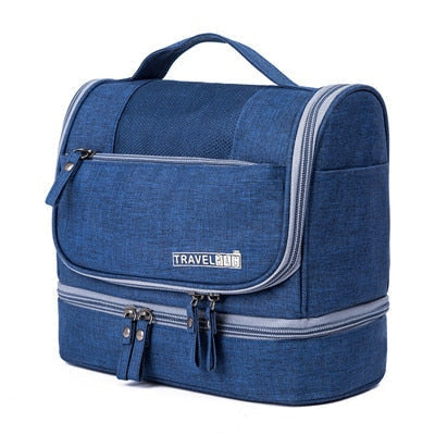 Organized interior of a large unisex hanging toiletry bag, storing various travel essentials.