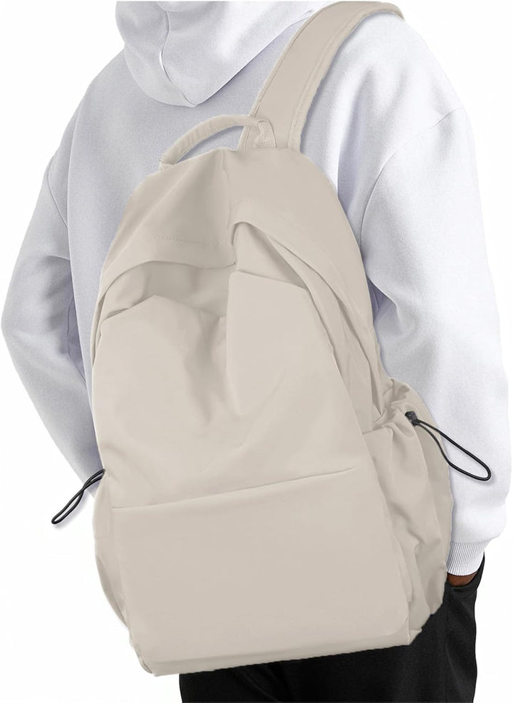 Lightweight unisex laptop backpack with organized storage for travel and daily commute.
