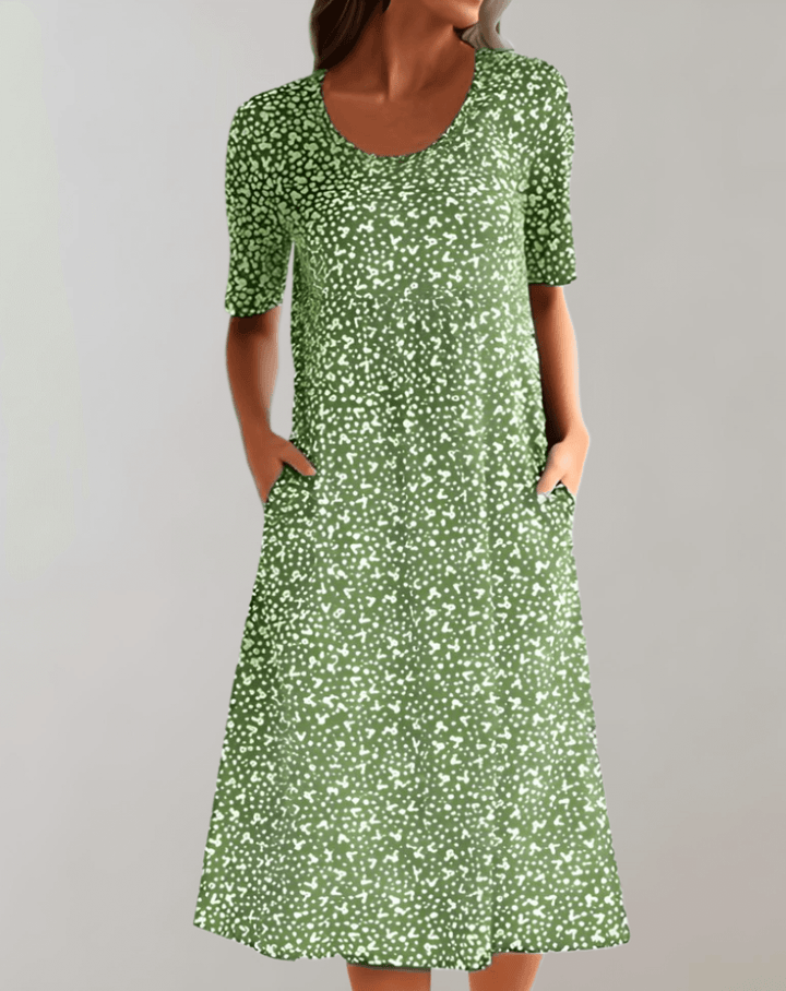 Lightweight women's V-neck summer dress, flowy and chic for warm weather casual or elegant wear.