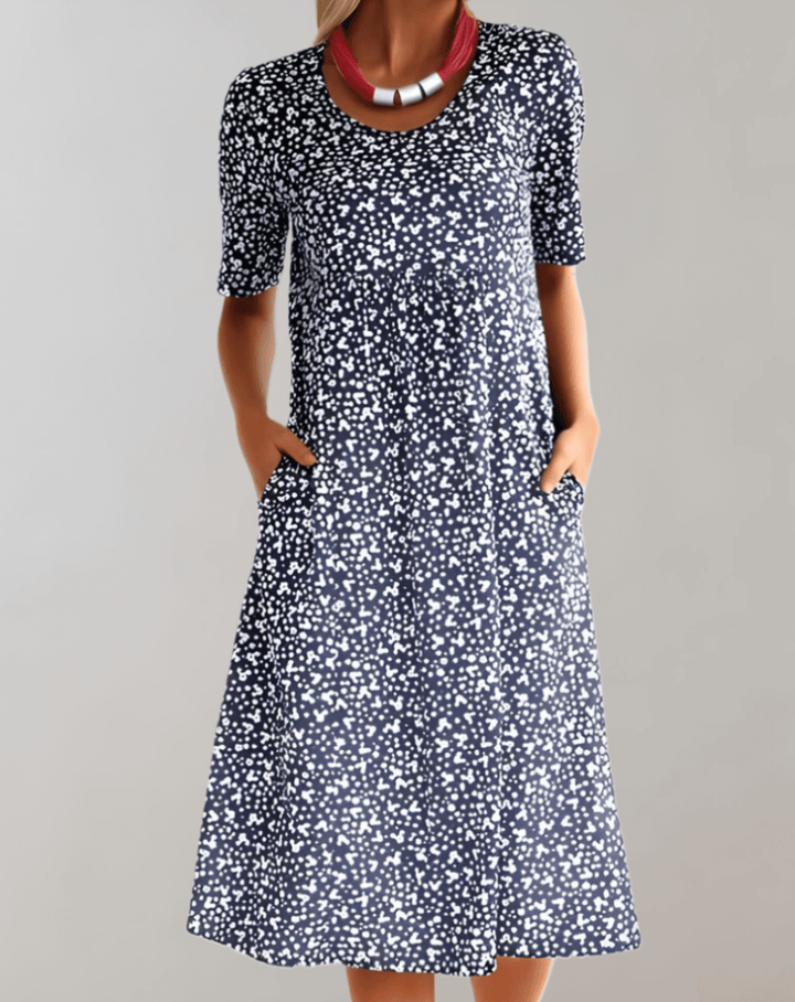 Effortless V-neck summer dress for women, lightweight and comfortable, ideal for warm weather day-to-night.