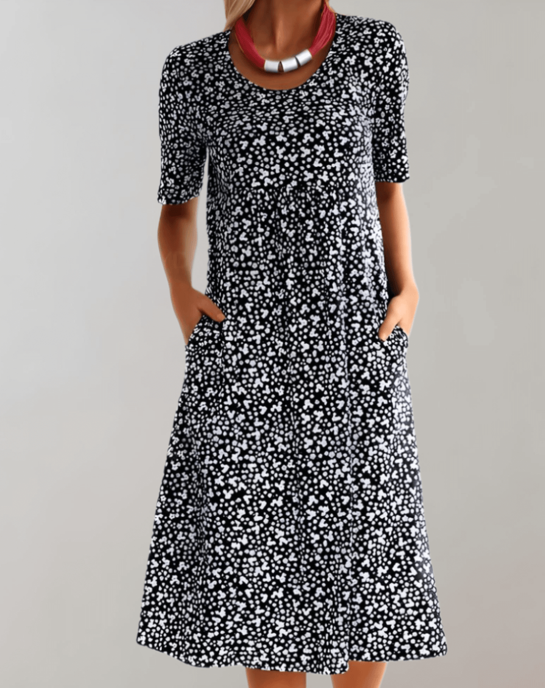 Stylish women's V-neck summer dress, lightweight and breathable, perfect for effortless warm-weather comfort.