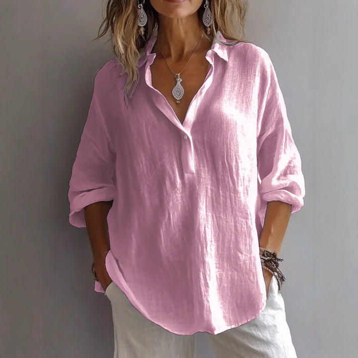 Comfortable women's loose fit button-down shirt, chic style, perfect for spring/summer fashion.