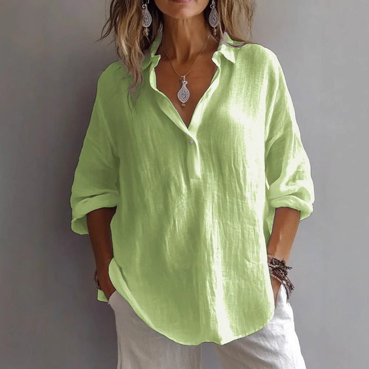 Everyday women's casual button-down blouse, loose fit, comfortable, versatile long sleeve top.