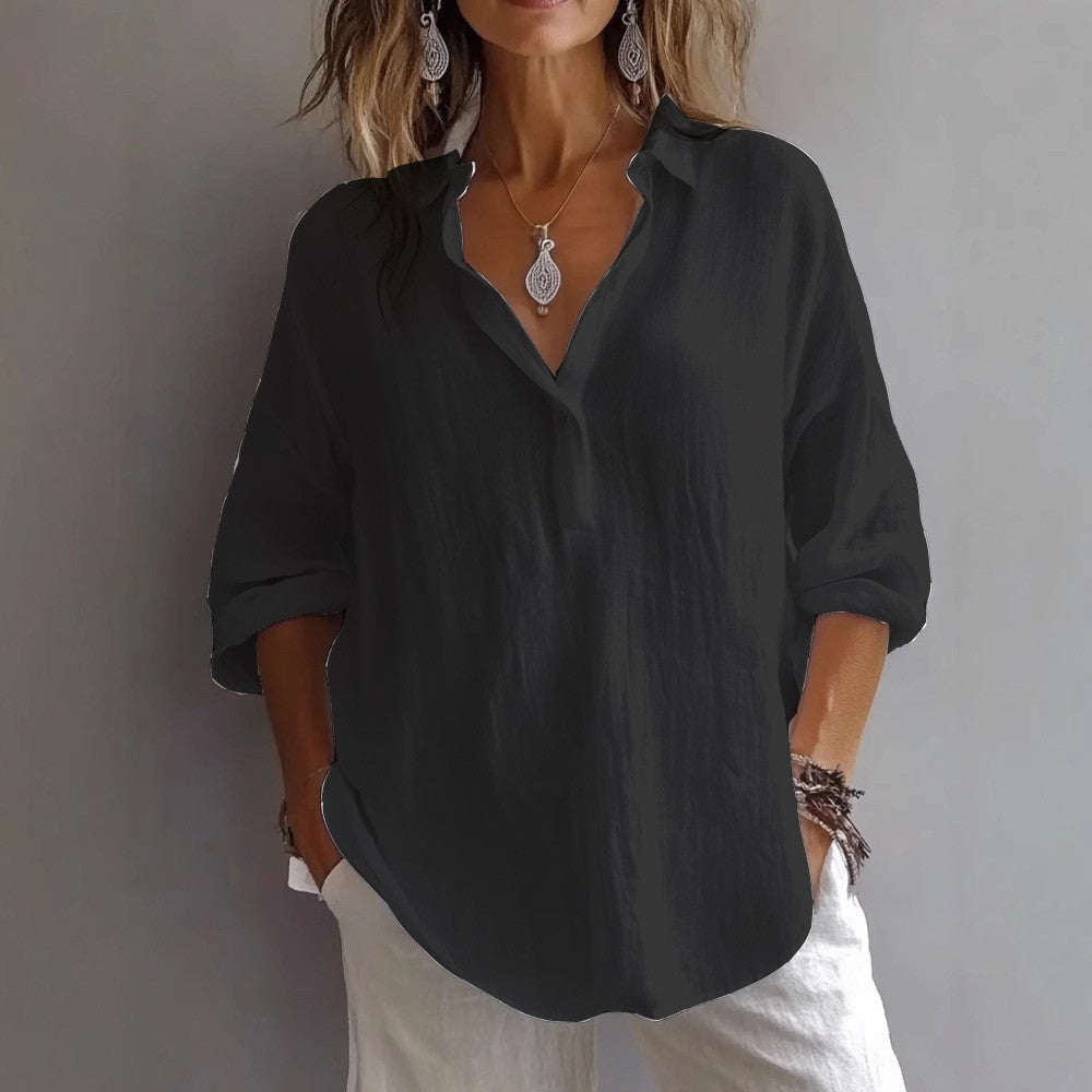 Women's chic loose fit button-down shirt with wide sleeves, a comfortable spring/summer blouse.