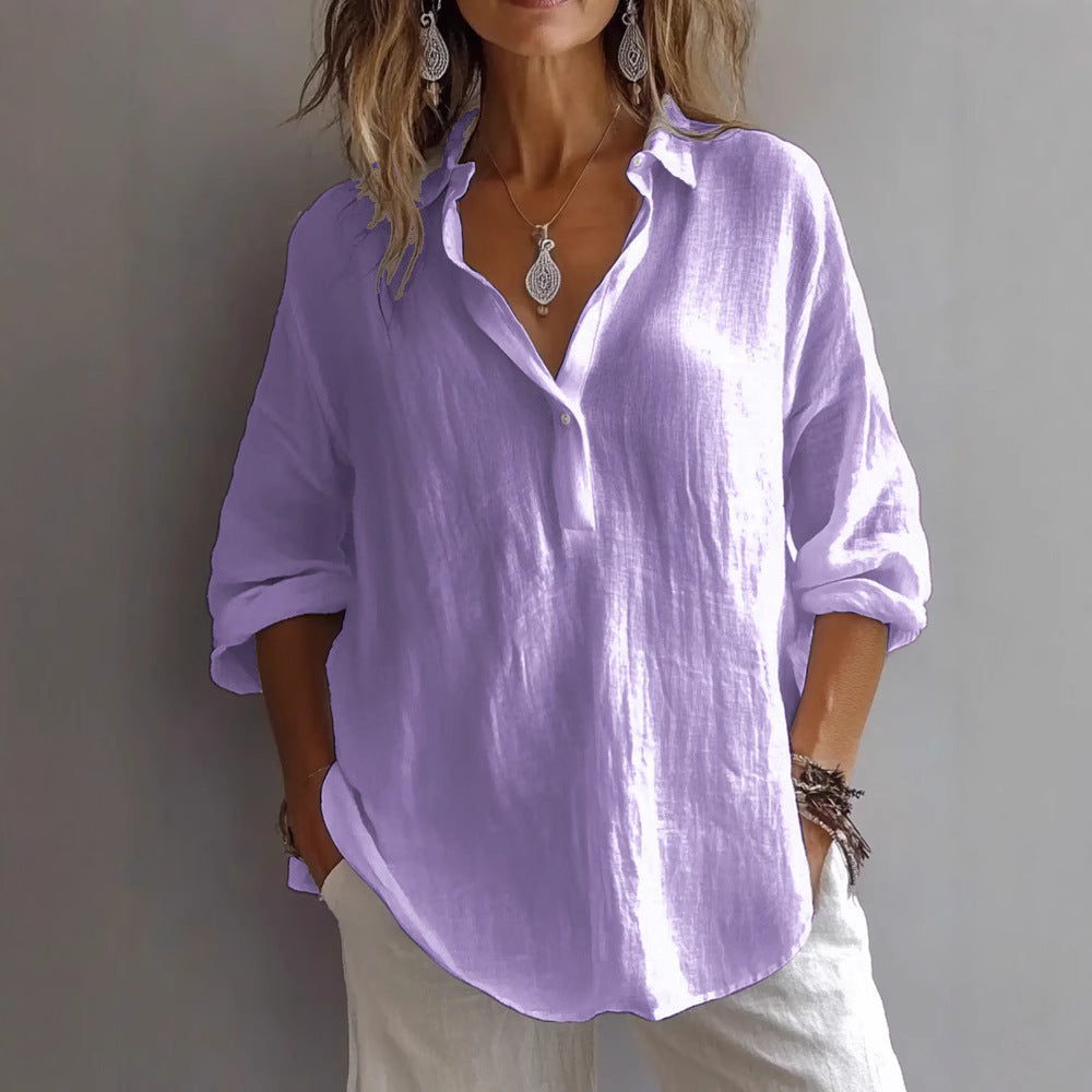 Relaxed fit women's button-down shirt, long wide sleeves, versatile casual top for everyday wear.