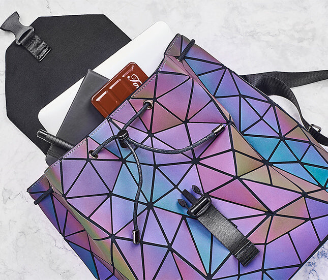Fashion-forward luminous women's backpack, geometric reflective pattern, waterproof and stylish.