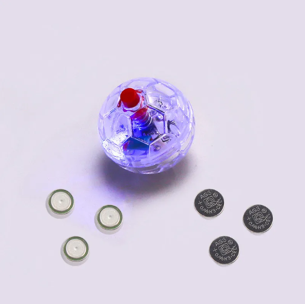 Interactive glowing football toy for dogs, featuring bright LED for enhanced visibility during evening fetch games.