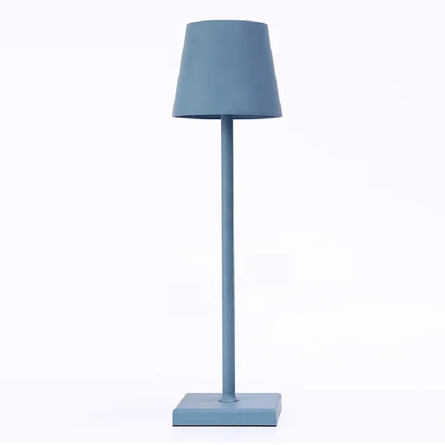Energy-efficient LumoGlow wireless LED lamp, rechargeable via USB, with touch control.