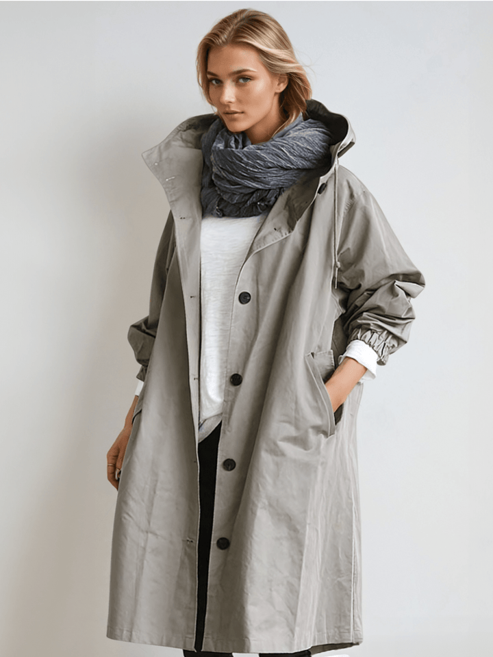 Women's stylish water-repellent trench coat. Classic design, perfect transitional outerwear for all-weather fashion.