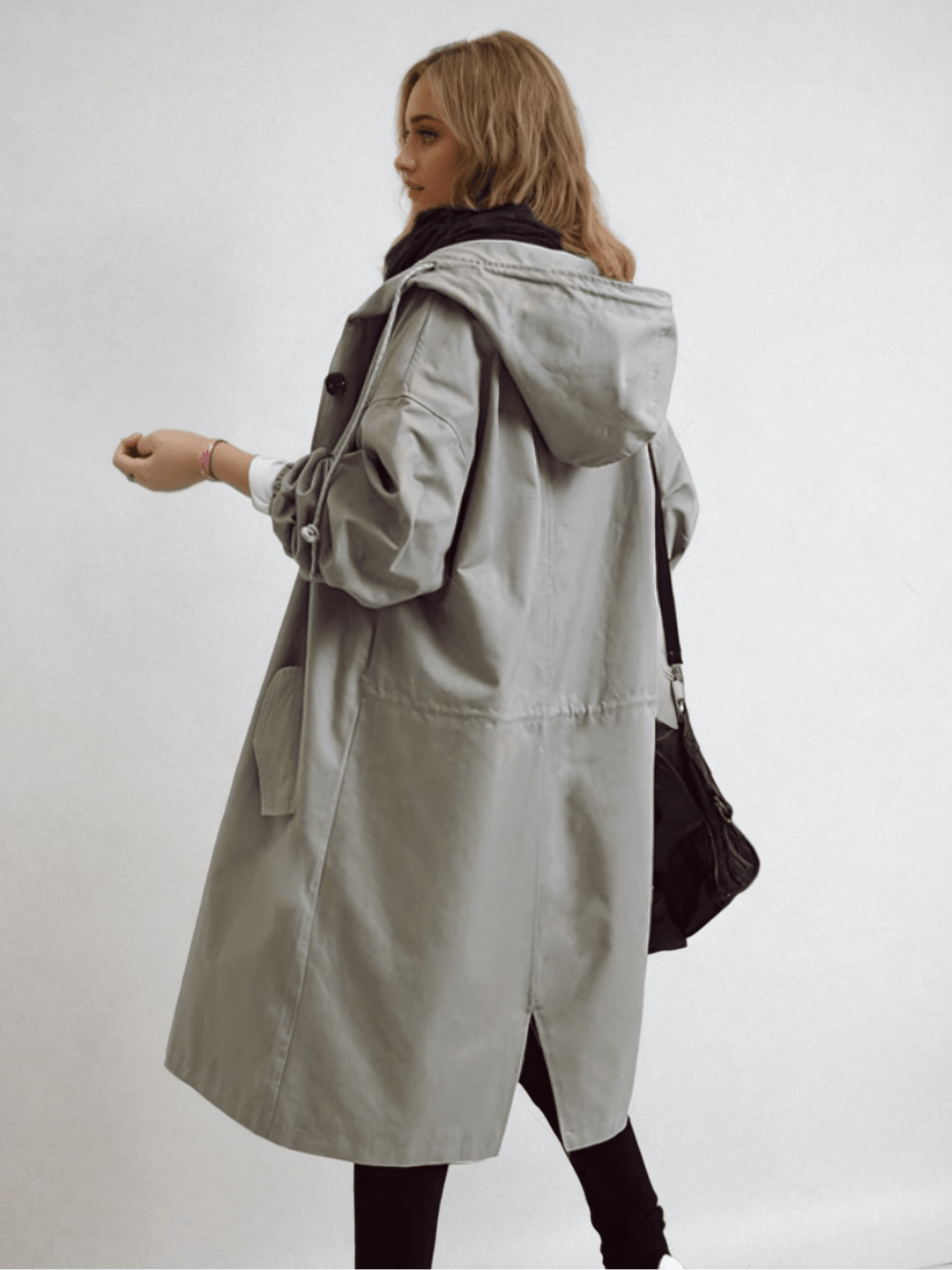 Women's stylish water-repellent trench coat. Classic, elegant, long outerwear for transitional & all-weather fashion.